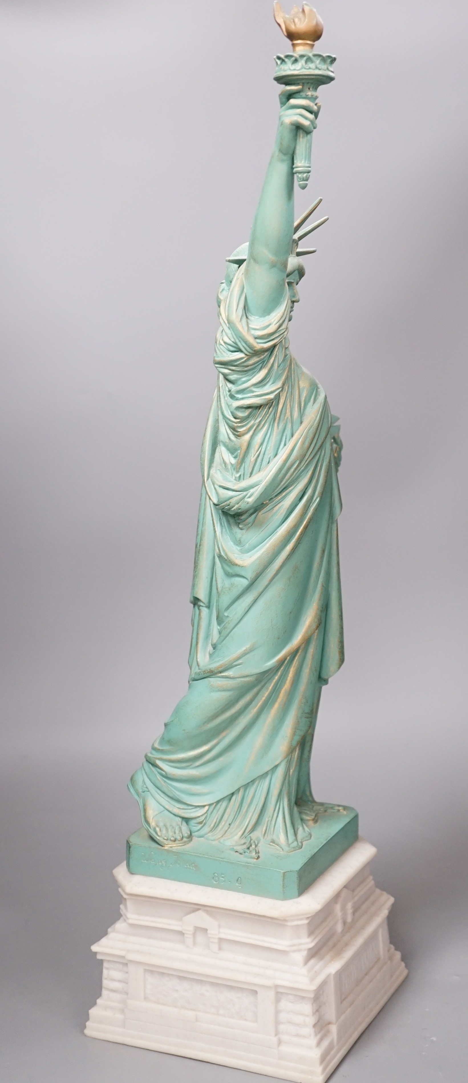 A Colbar Art Inc. bronzed resin model of the Statue of Liberty. 60cm high